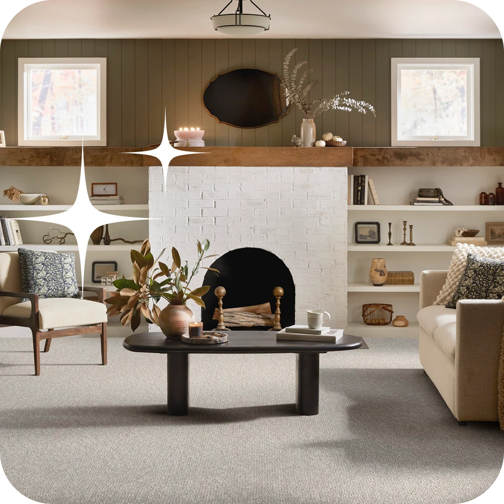 Carpet in contemporary sitting room with white brick fireplace | Lloyd's Carpets & Draperies