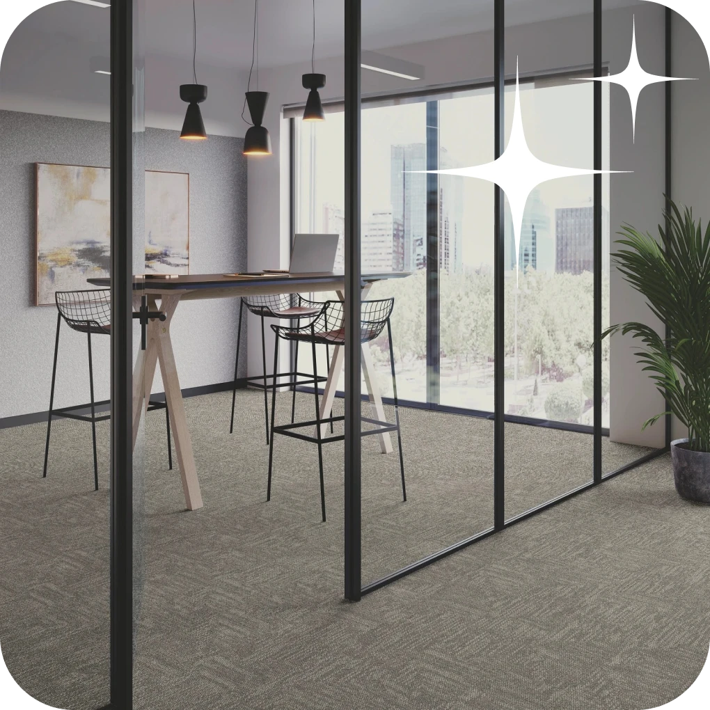 Commercial office with glass divider and carpet tile | Lloyd's Carpets & Draperies