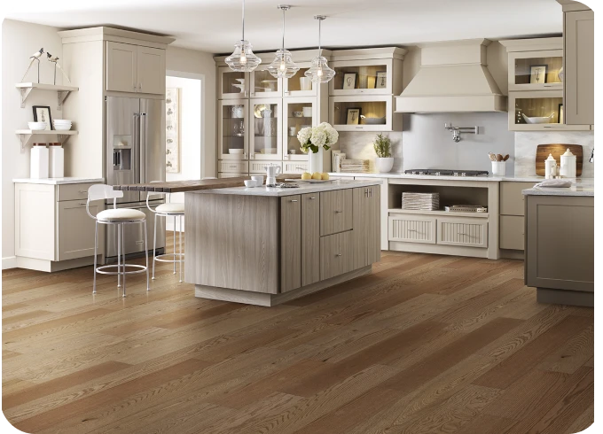Honey colored hardwood in contemporary kitchen | Lloyd's Carpets & Draperies