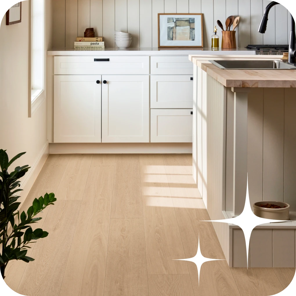 Laminate flooring in monotone kitchen area | Lloyd's Carpets & Draperies
