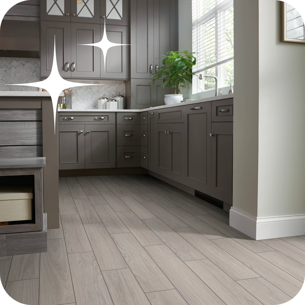 Gray wood-look tile in kitchen with medium gray cabinetry | Lloyd's Carpets & Draperies